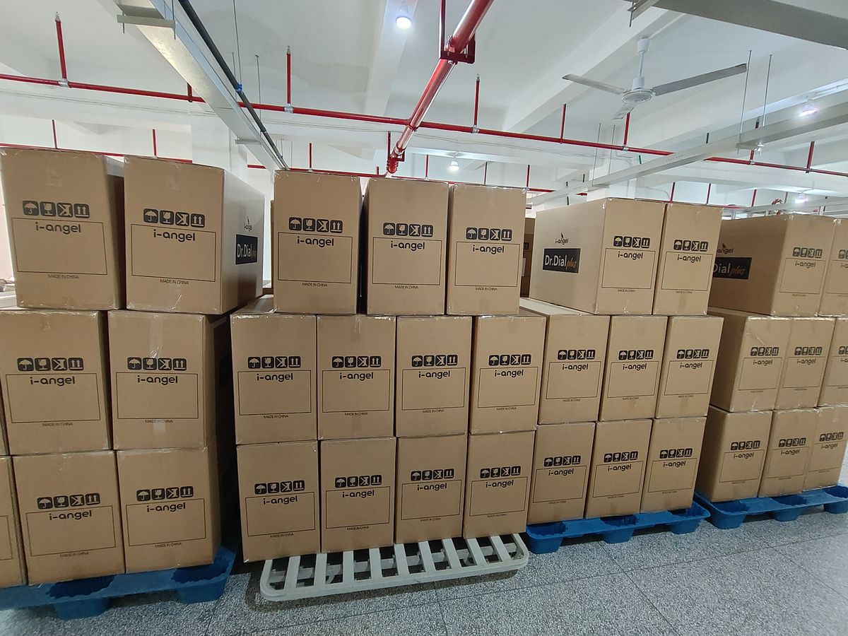 Finished goods boxed and stacked on pallets in the warehouse.