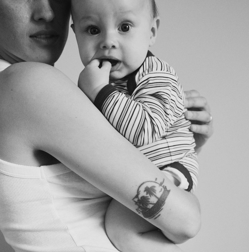 A parent holding a baby